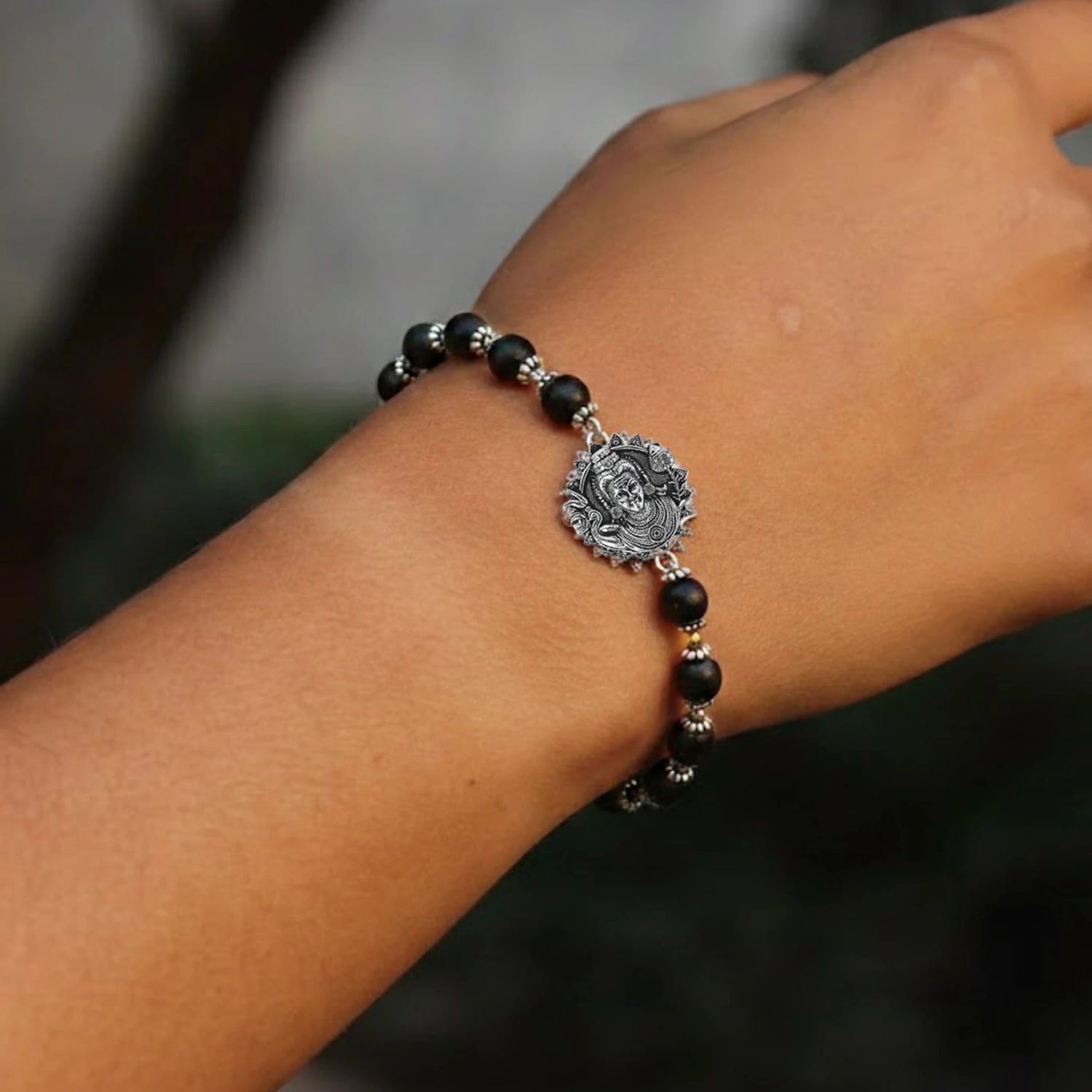 Lord Murgan Face Bracelet with Silver Capped Karungali